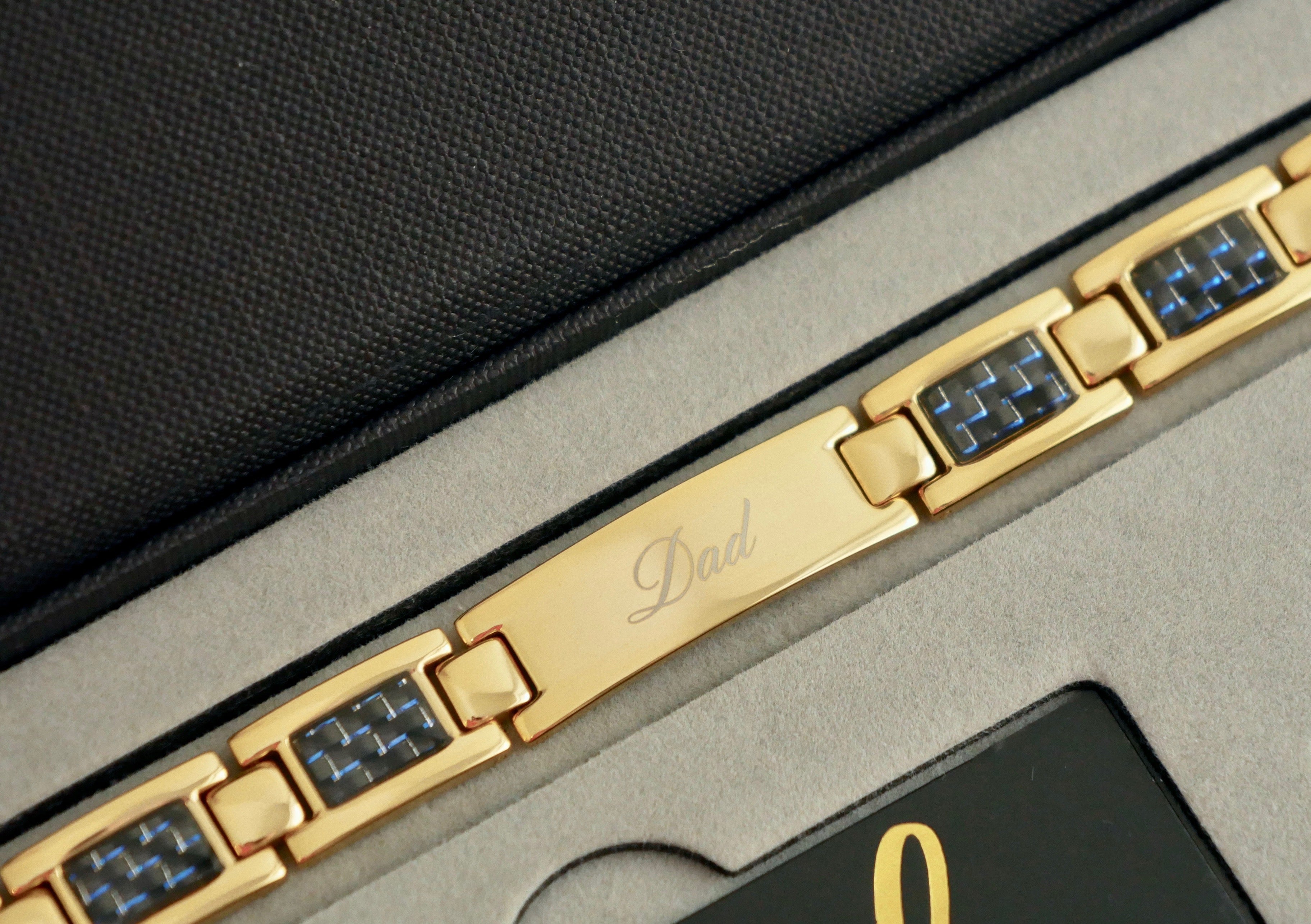 close up view of Best Dad Ever Titanium Bracelet in gift box